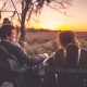 Bride and Groom Relaxing by the Marsh