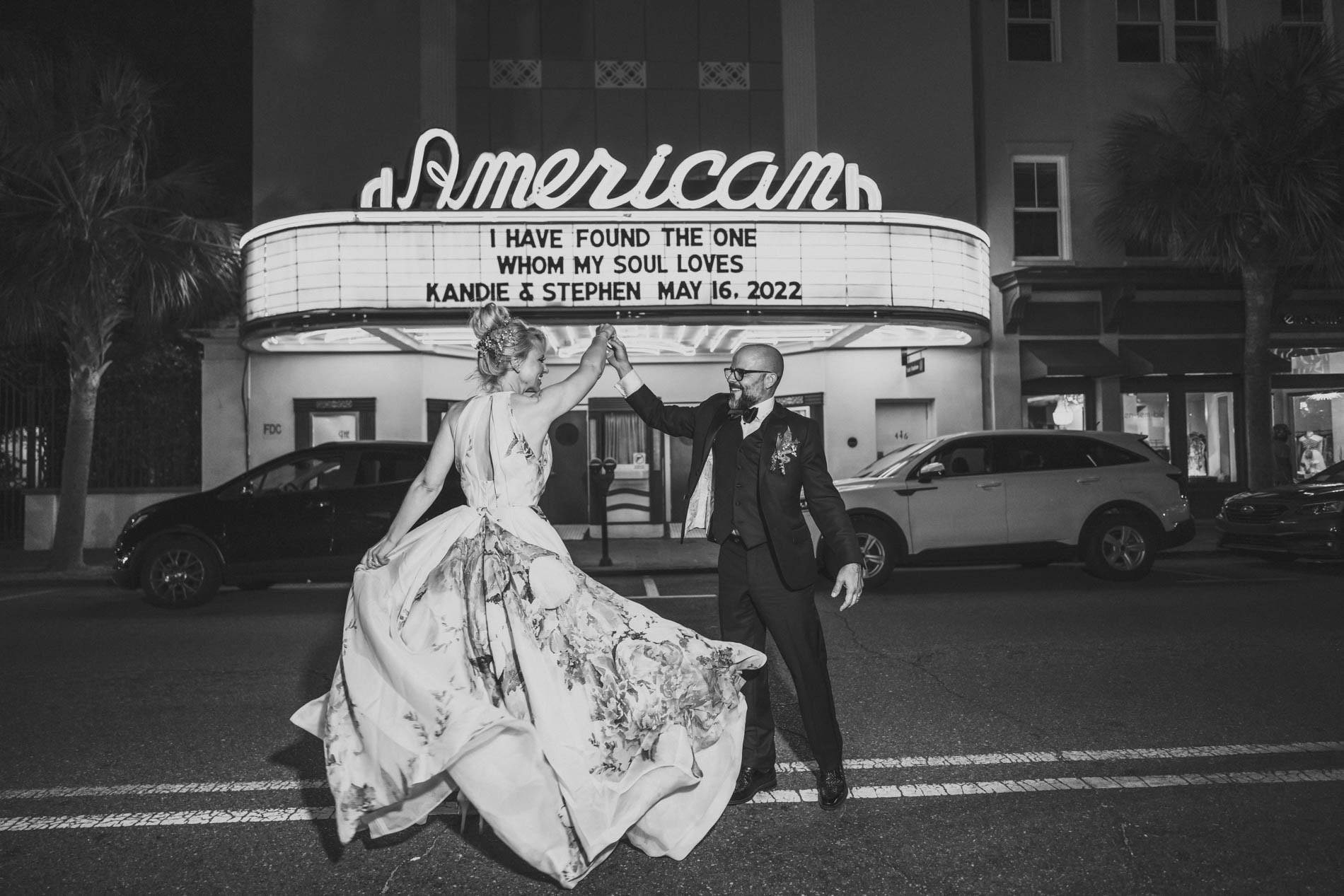 American Theater Marquee Wedding Portrait Bride and groom dancing beneath their personalized wedding marquee at the American Theater
