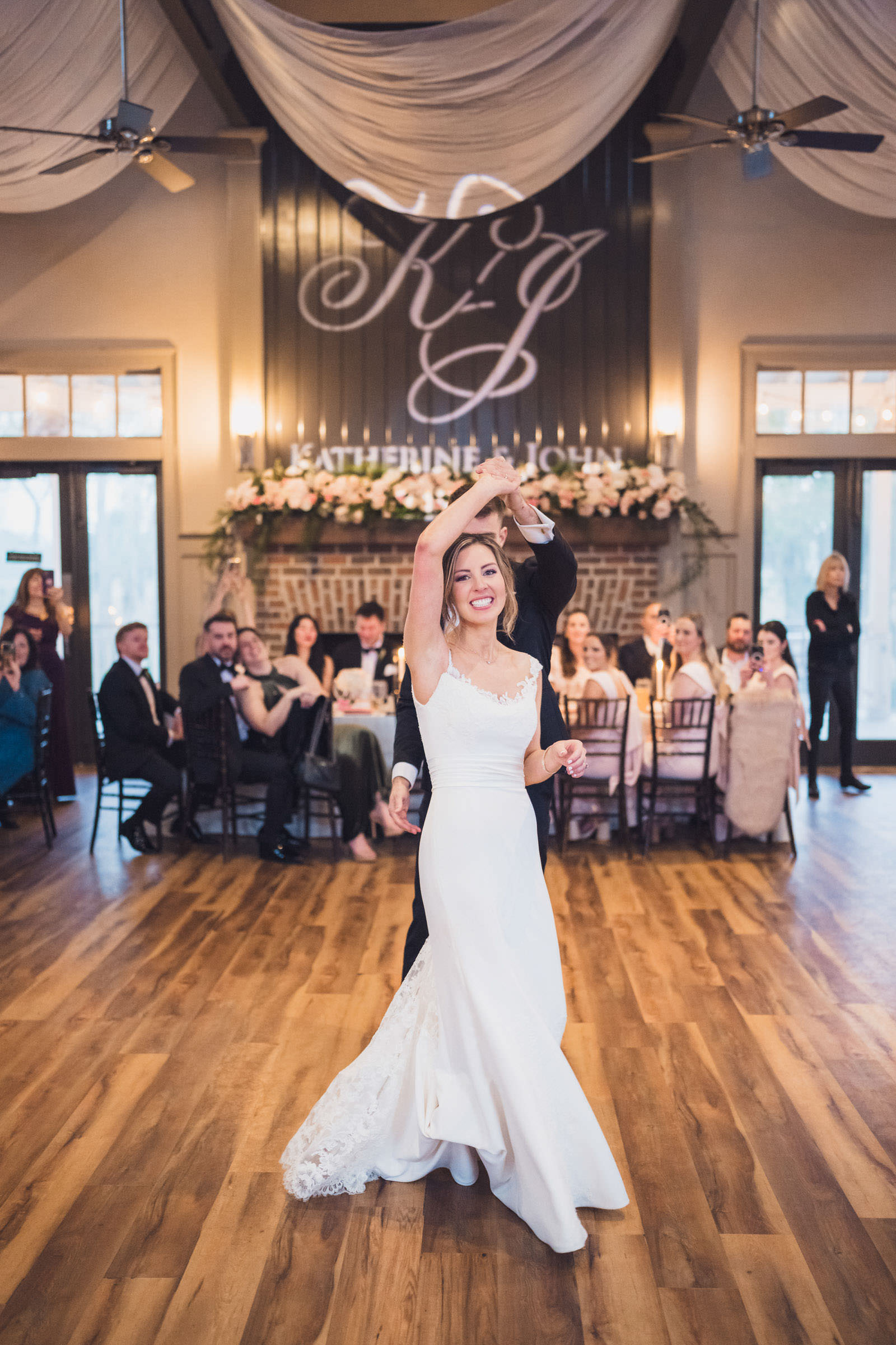 Twirl Bride spinning on the dance floor during her wedding reception inside Creek Club at I’On in Mount Pleasant.