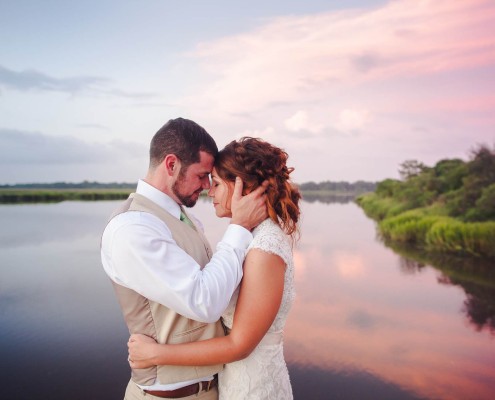 River Sunset with bride and groom wedding portrait