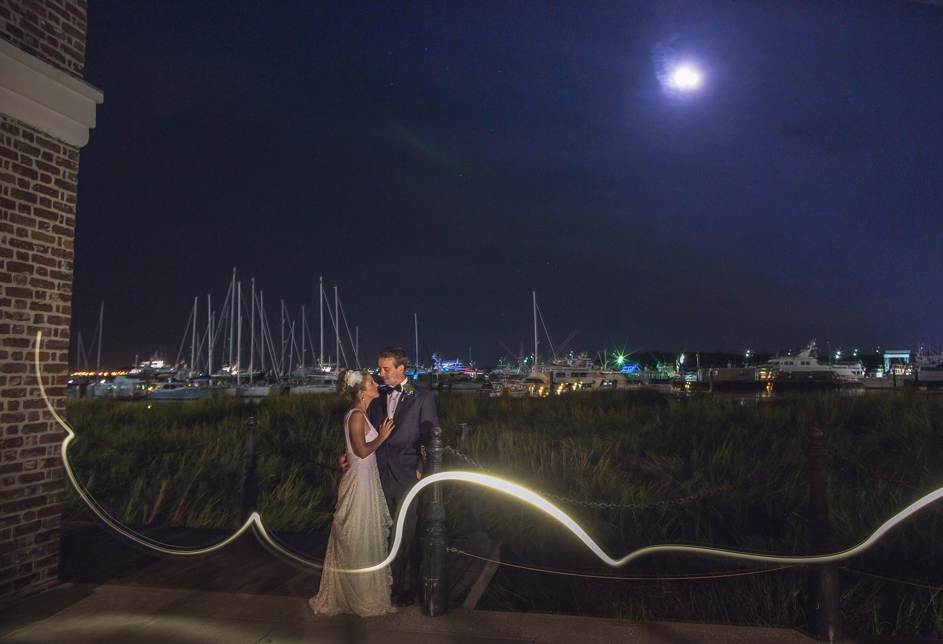 Charleston Harbor Night Shot Bride and groom