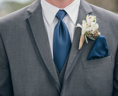 Boutonniere, tie and handkerchief