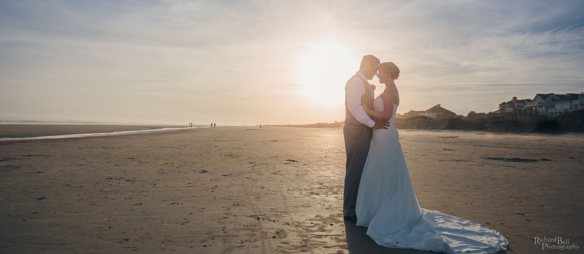 Bride and Groom on beach of Wild Dunes