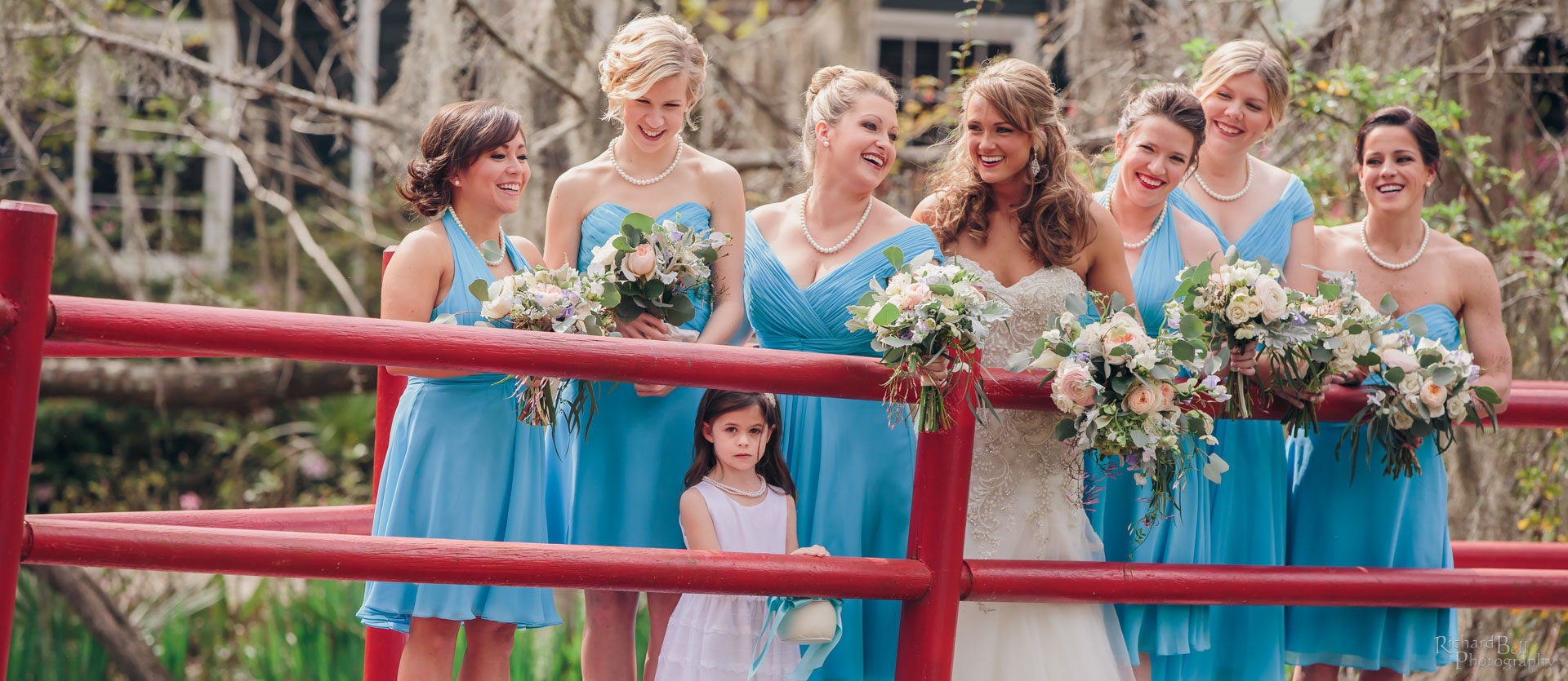 Bride with Bridesmaids on Red Bridge