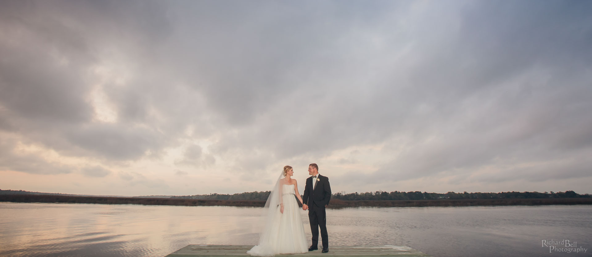 Bride and Groom on Dock at Magnolia