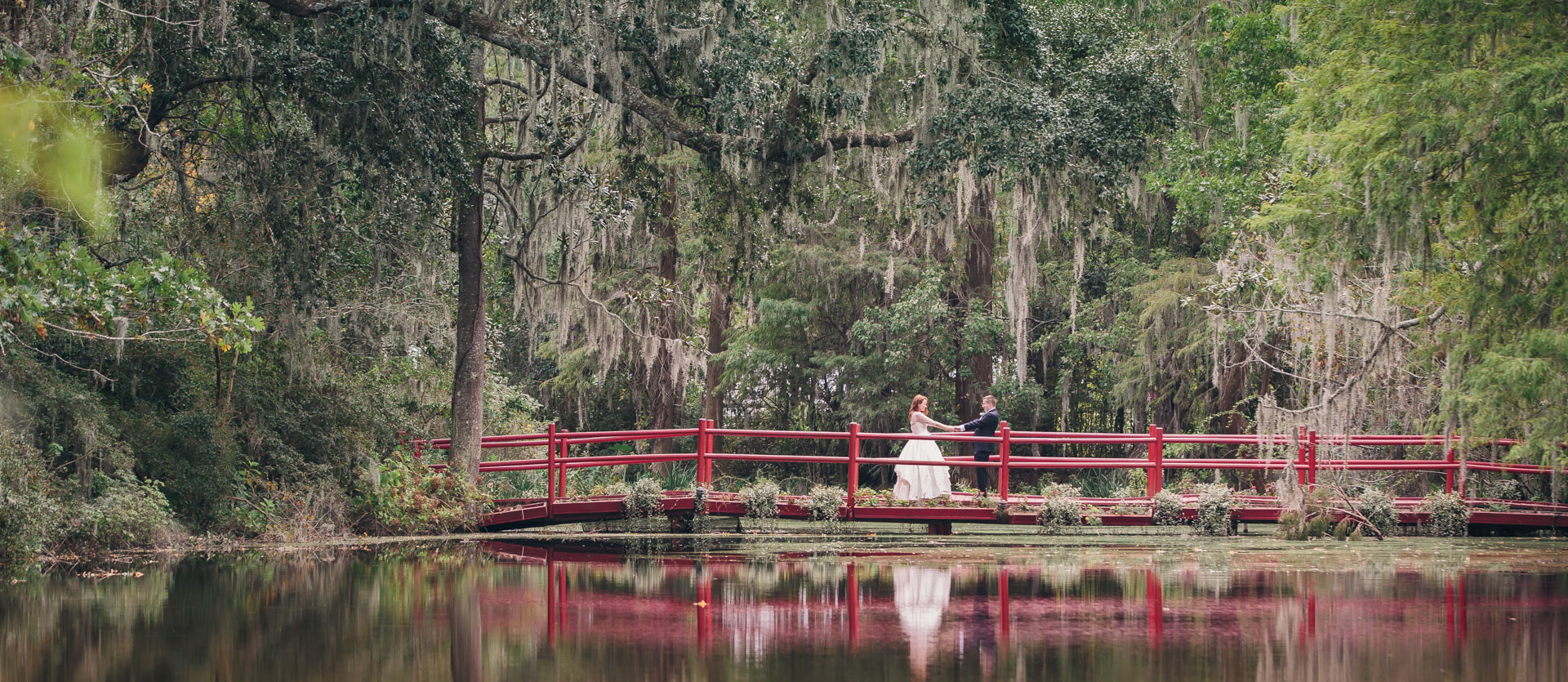 red-bridge-with-bride-and-groom