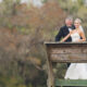 Bride and Groom on a dock at Lovegrove Estate