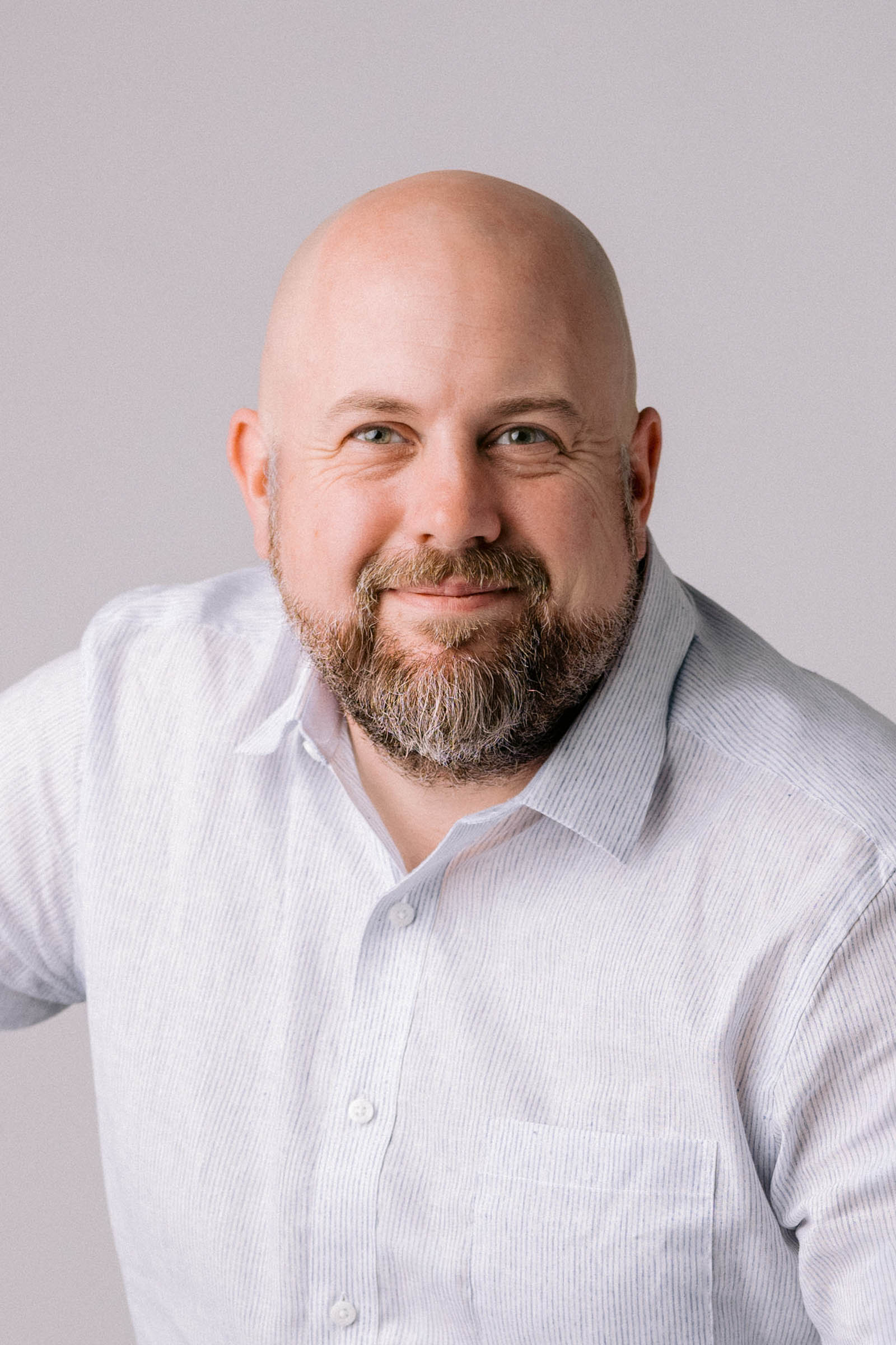 Head and shoulders portrait of Charleston Wedding Photographer Nathan Bell